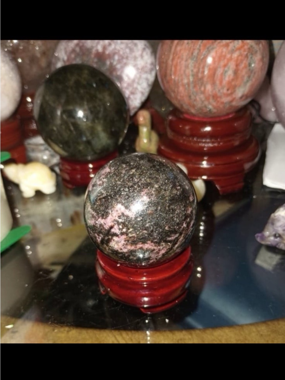 Icy Rhodonite Sphere - Picture 4 of 4
